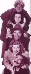 Harpo, Ann Miller, Chico, Lucille Ball, and Groucho pose.