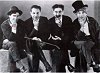 Chico, Zeppo, Groucho, and Harpo in deep thought.