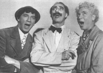 Chico, Groucho, and Harpo in a group portrait taken during the filming of 'A Night in Casablanca.'