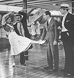 Thelma Todd, Groucho, Zeppo, and Harry Woods in a scene from the film